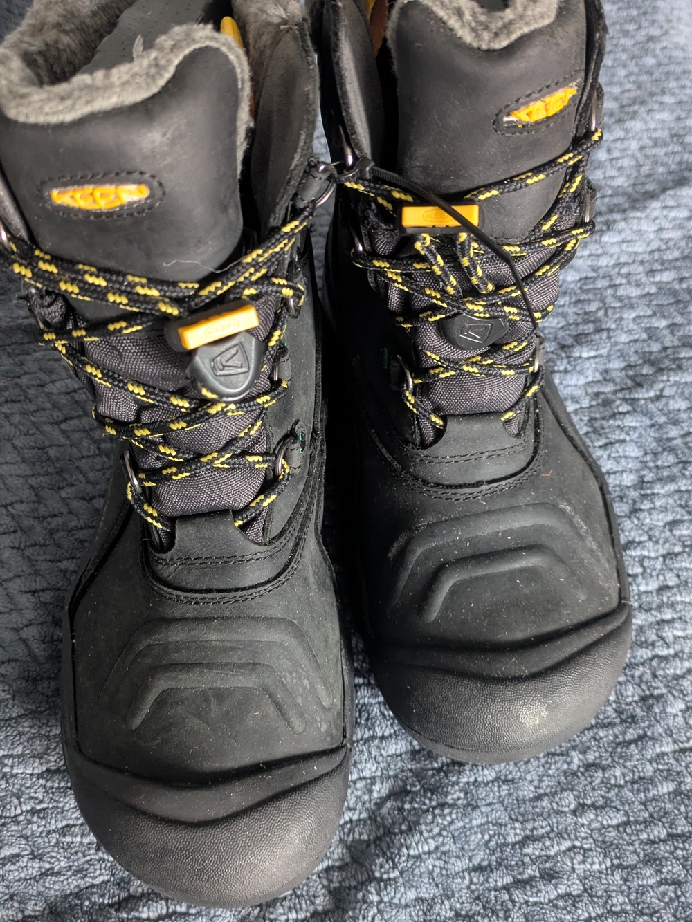 Keen Kids Black Winter Boots with Yellow Accents